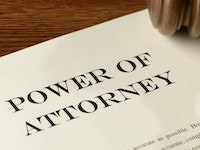 Power of attorney document and gavel